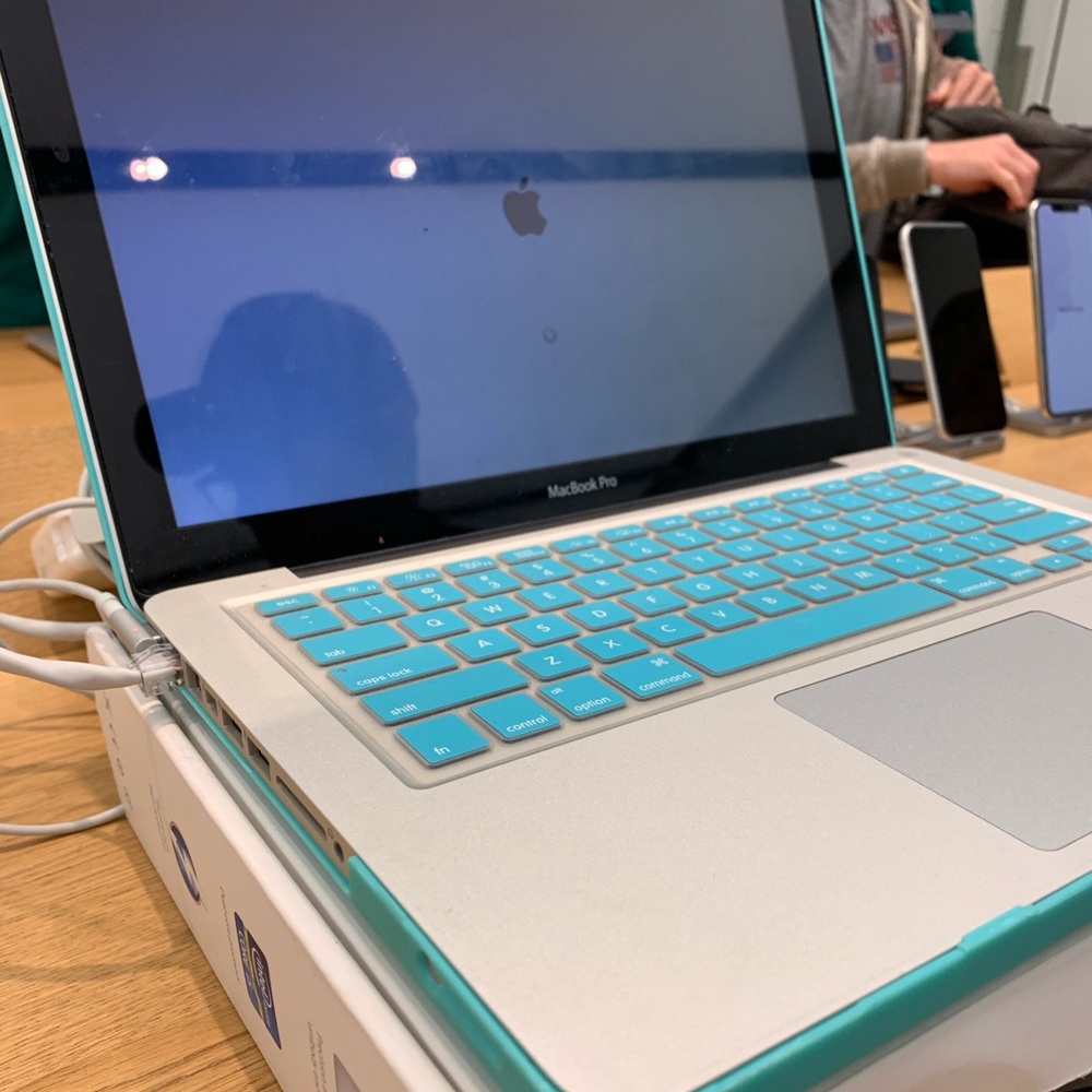 Mac book pro with box, adapter, charger.